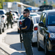 Police officers secure the area